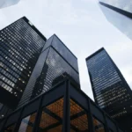 low angle photo of city high rise buildings during daytime