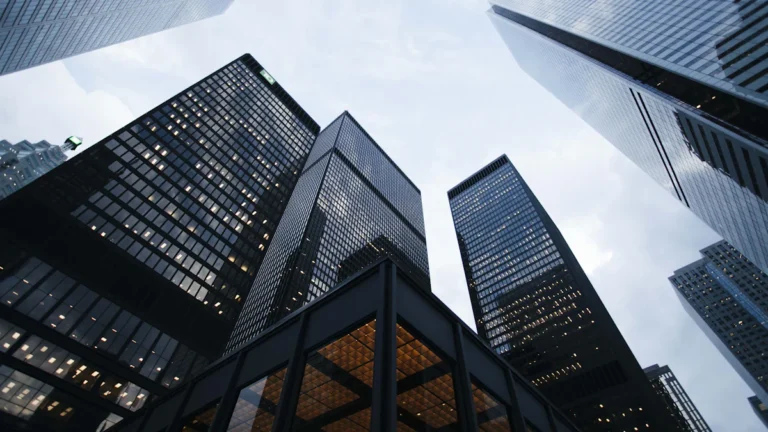 low angle photo of city high rise buildings during daytime
