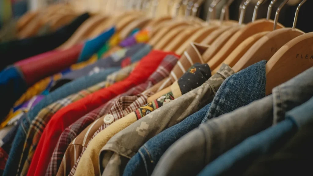 Colorful jackets on a clothing rack, illustrating Shopify collection pages and filters