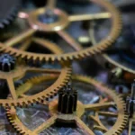 Brass clockwork gears, illustrating Shopify Flow automations