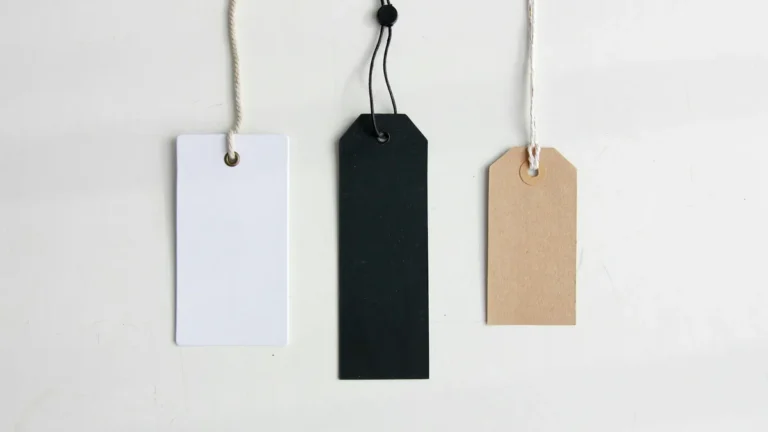 Blank white, black and kraft product tags, illustrating Shopify metafields for product details